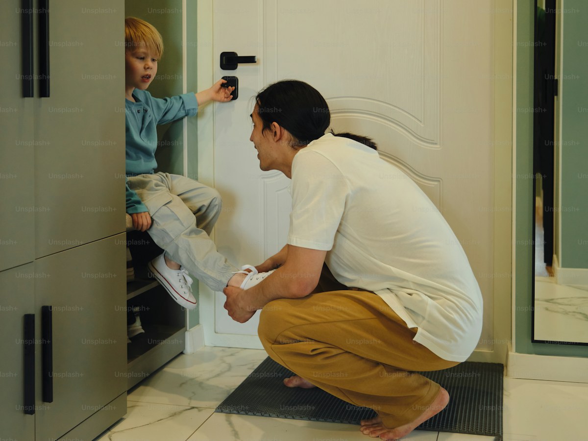 Father and son at the doorway